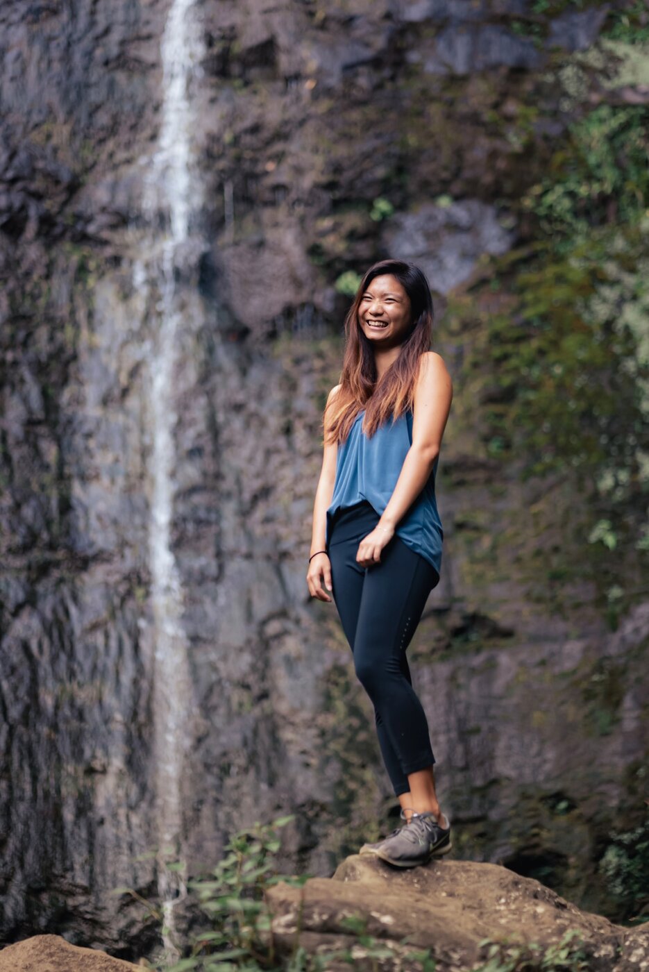 Karis at a waterfall — calm, present